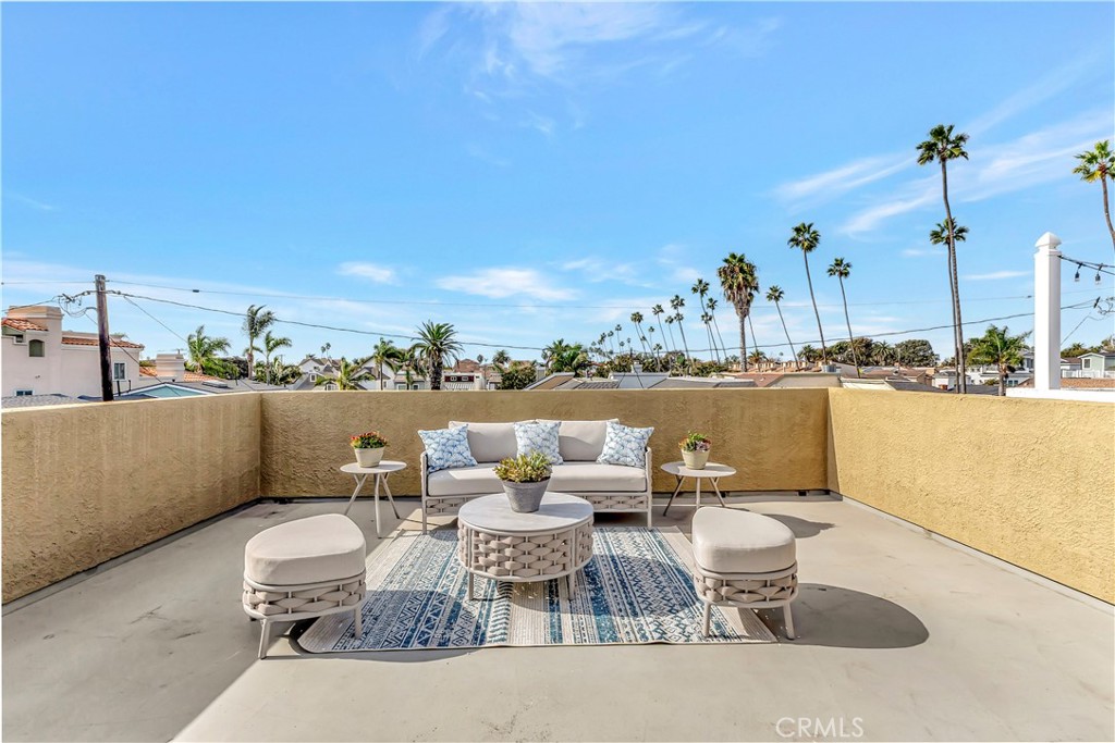621 8th Street Huntington Beach, CA 92648 - Photo 47 of 58 a view of a terrace with furniture and stove
