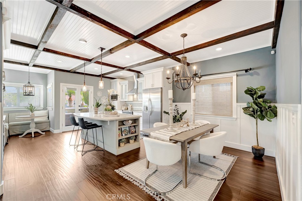 621 8th Street Huntington Beach, CA 92648 - Photo 5 of 58 a view of a livingroom with furniture and a potted plant
