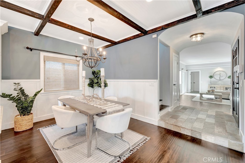 621 8th Street Huntington Beach, CA 92648 - Photo 8 of 58 a view of a dining room with furniture and wooden floor