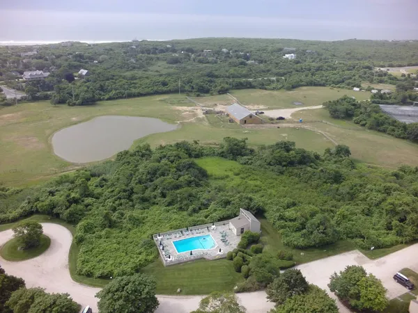 an aerial view of ocean residential house and outdoor space