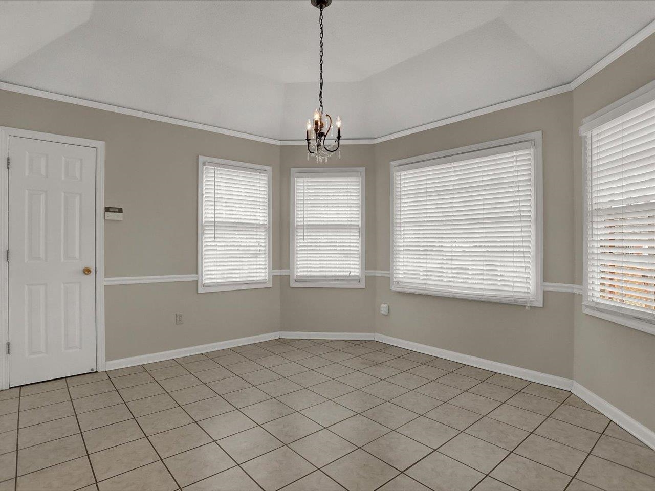 560 Fletcher Road Collierville, TN 38017 - Photo 9 of 25 a view of an empty room with a window