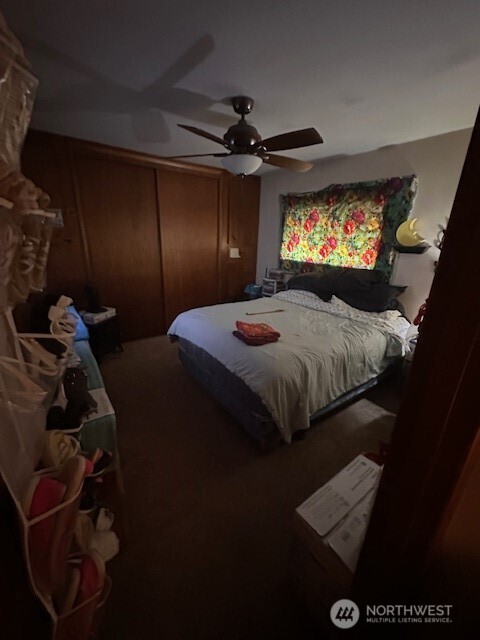 412 South 3rd Street McCleary, WA 98557 - Photo 2 of 14 a bedroom with bed and a mirror