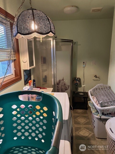 412 South 3rd Street McCleary, WA 98557 - Photo 8 of 14 a bathroom with a sink mirror and toilet