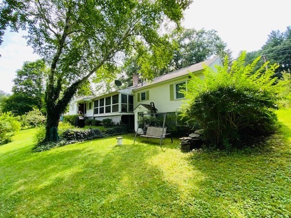 140 Valley Road Barre, MA 01005 - Photo 6 of 40 a view of a house with a yard patio and a patio