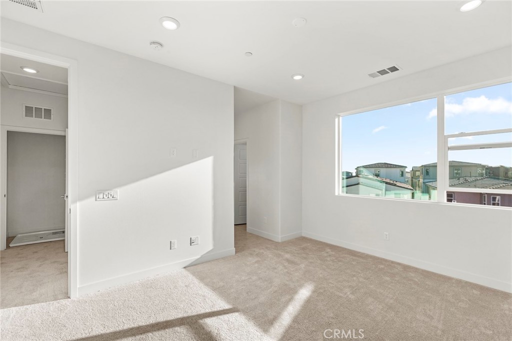 234 Siena Lake Forest, CA 92630 - Photo 14 of 22 a view of an empty room with a window