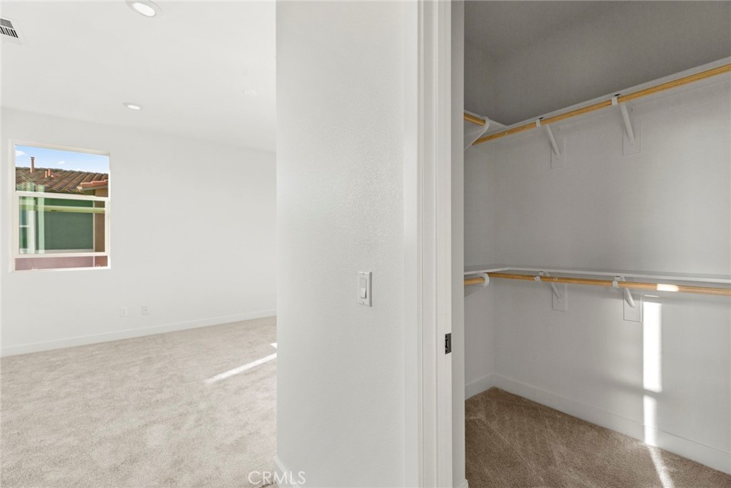 234 Siena Lake Forest, CA 92630 - Photo 15 of 22 a view of an empty walk in closet