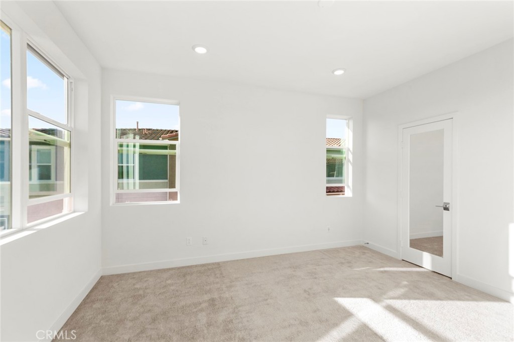 234 Siena Lake Forest, CA 92630 - Photo 16 of 22 an empty room with windows