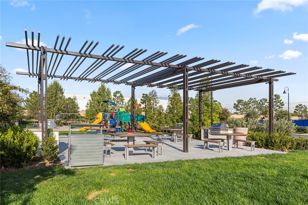 234 Siena Lake Forest, CA 92630 - Photo 20 of 22 a view of a swimming pool with chairs in patio