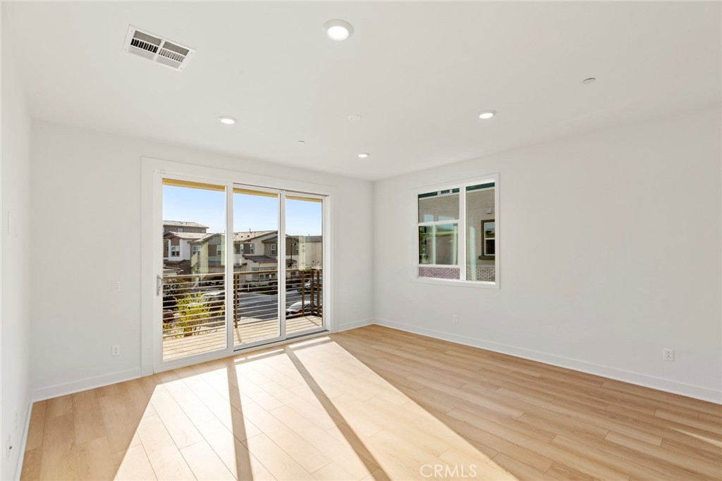 234 Siena Lake Forest, CA 92630 - Photo 8 of 22 a view of an empty room with a window