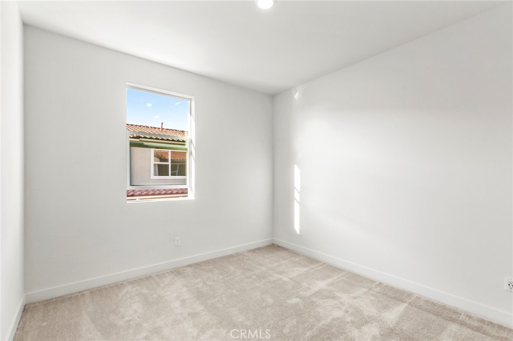 234 Siena Lake Forest, CA 92630 - Photo 10 of 22 an empty room with windows