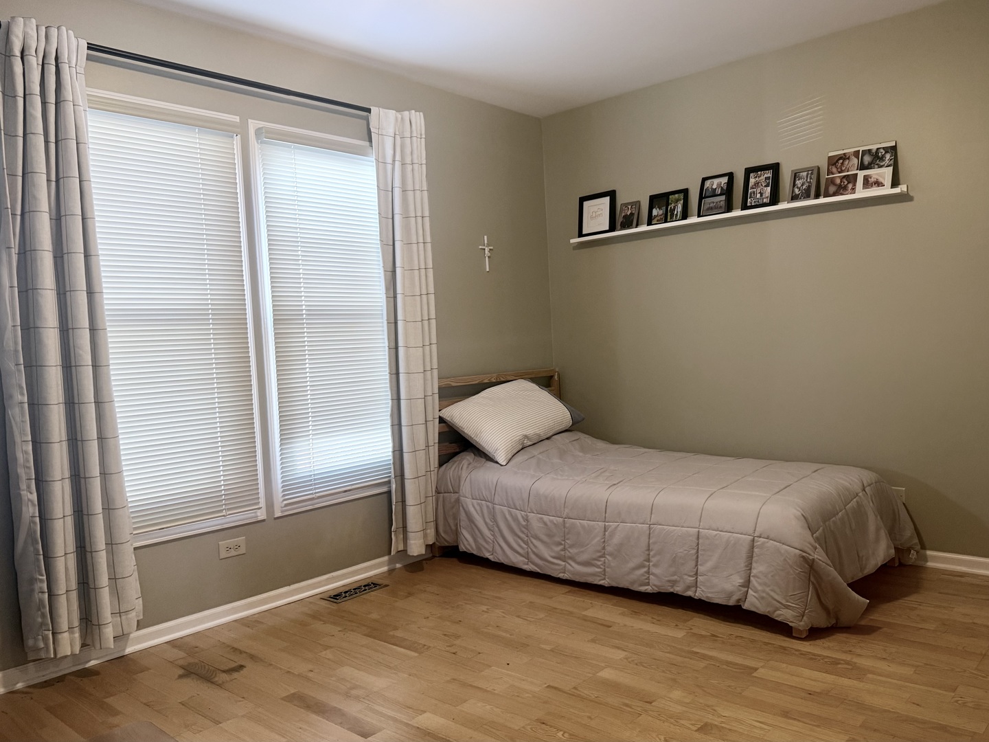 256 Haber Court Cary, IL 60013 - Photo 11 of 18 a bedroom with a bed and a window
