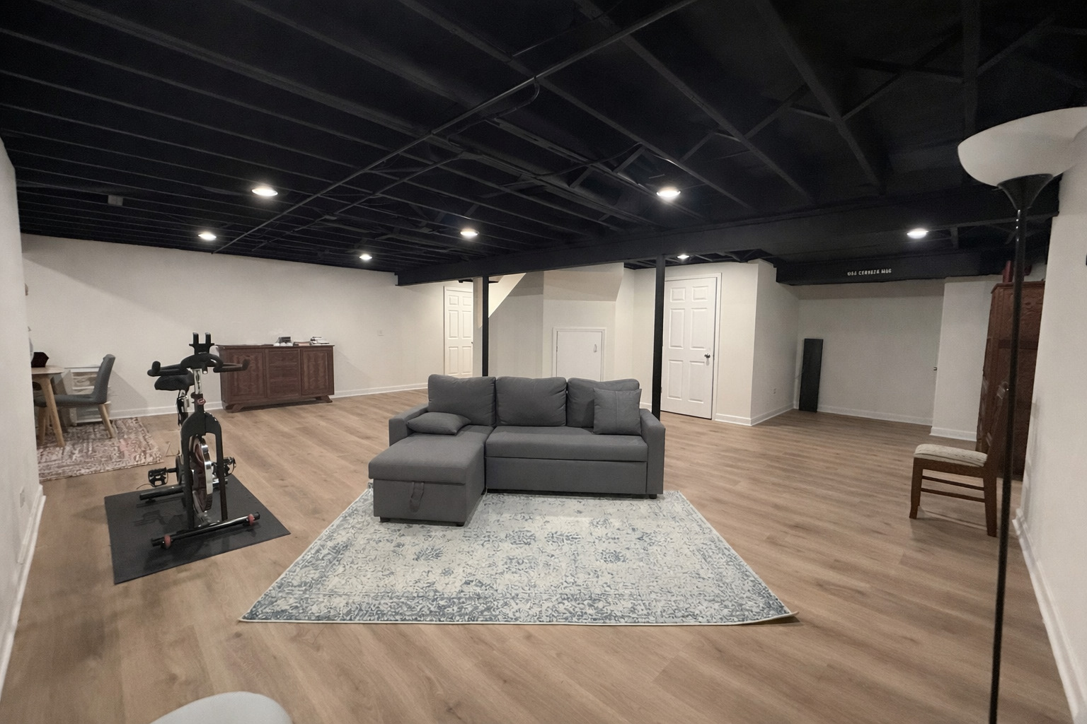 256 Haber Court Cary, IL 60013 - Photo 13 of 18 a living room with furniture and a wooden floor