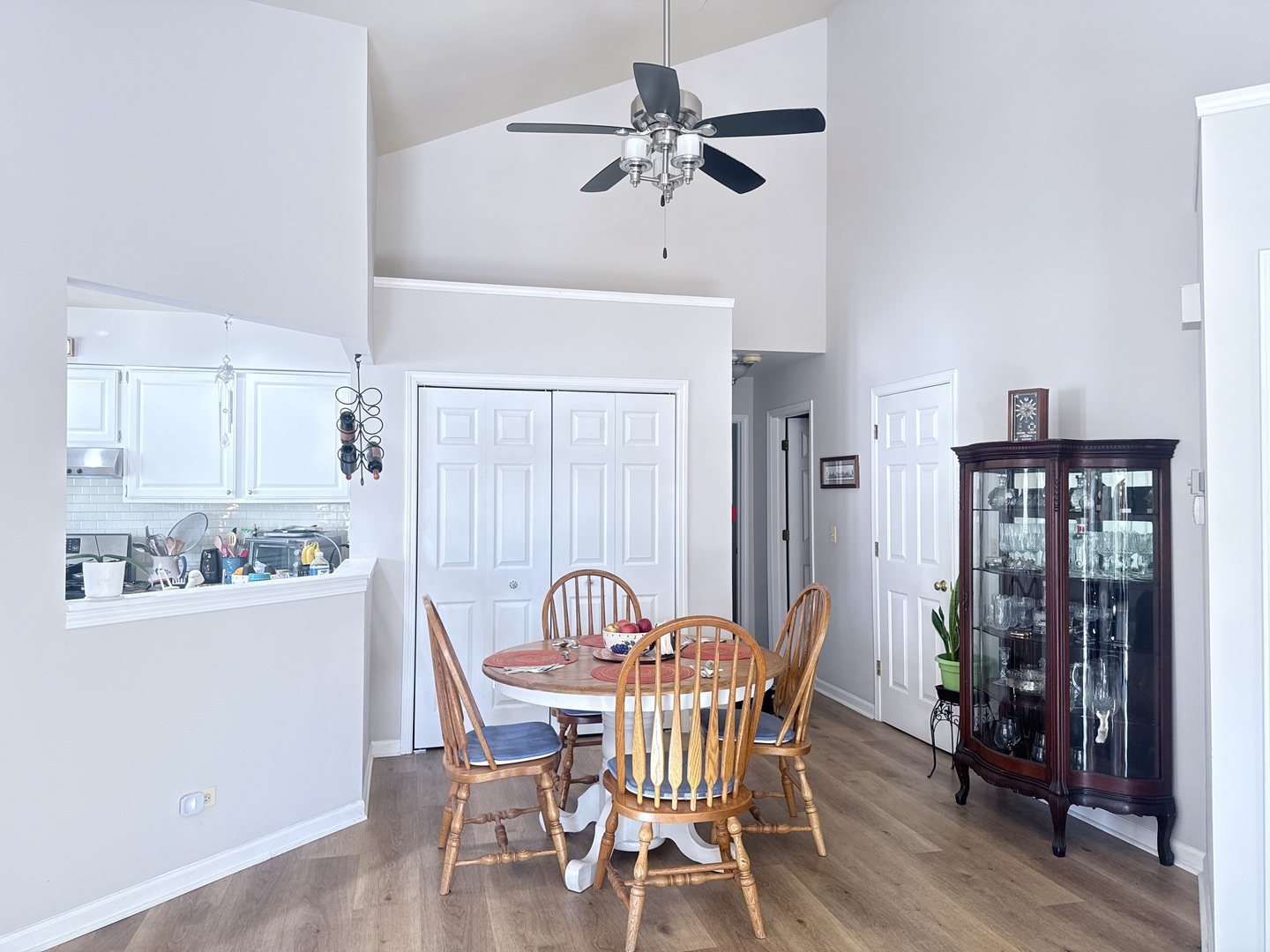 256 Haber Court Cary, IL 60013 - Photo 5 of 18 a view of a dining room with furniture and a chandelier fan