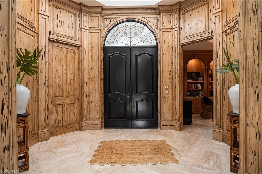 248 Point Salerno Naples, FL 34108 - Photo 25 of 42 a view of entryway with a front door