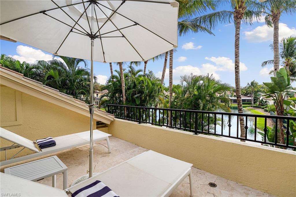 248 Point Salerno Naples, FL 34108 - Photo 33 of 42 a view of a balcony with an outdoor space