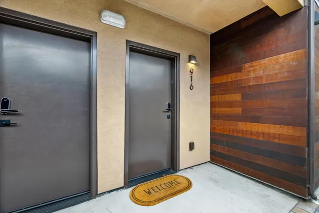 a view of an entryway with wooden floor