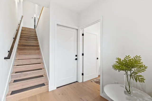 a view of entryway with wooden floor