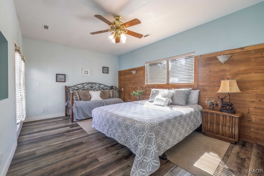 684 Chipmunk Lane Big Bear Lake, CA 92315 - Photo 16 of 49 a bedroom with bed and window