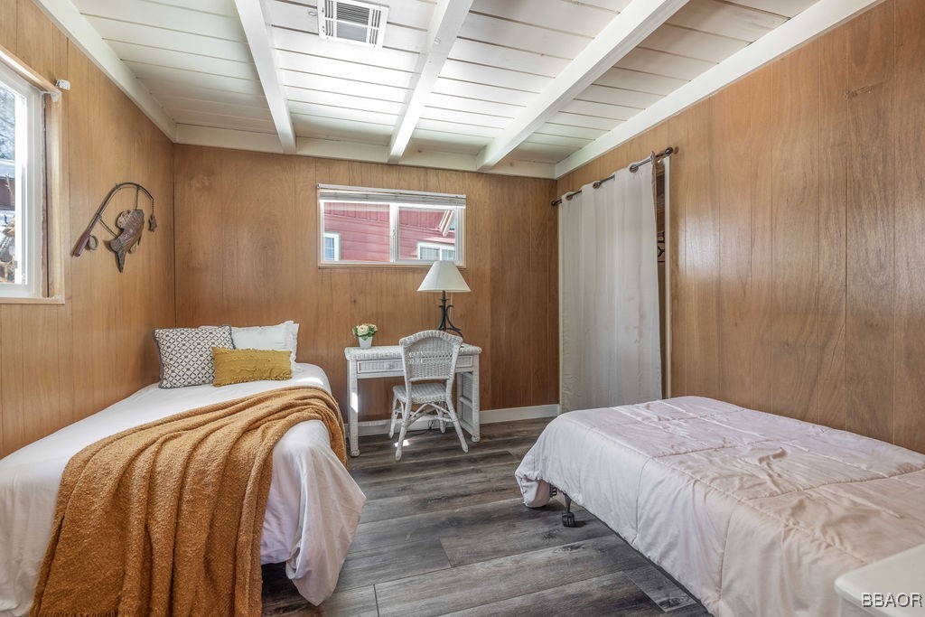 684 Chipmunk Lane Big Bear Lake, CA 92315 - Photo 17 of 49 a bedroom with a bed and a table