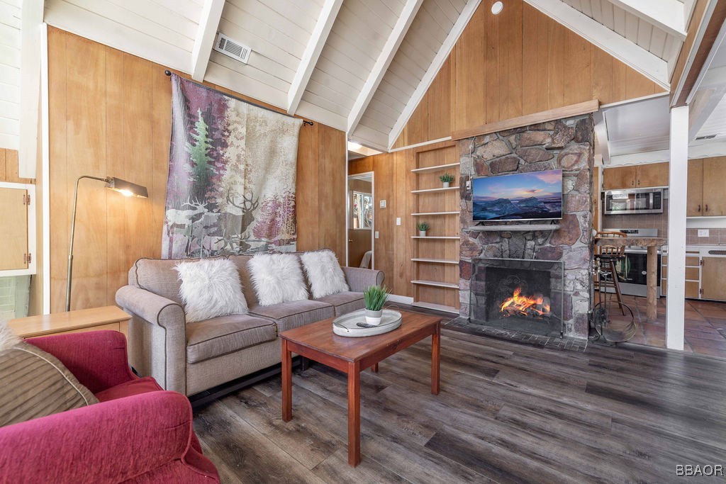 684 Chipmunk Lane Big Bear Lake, CA 92315 - Photo 3 of 49 a living room with furniture and a fireplace