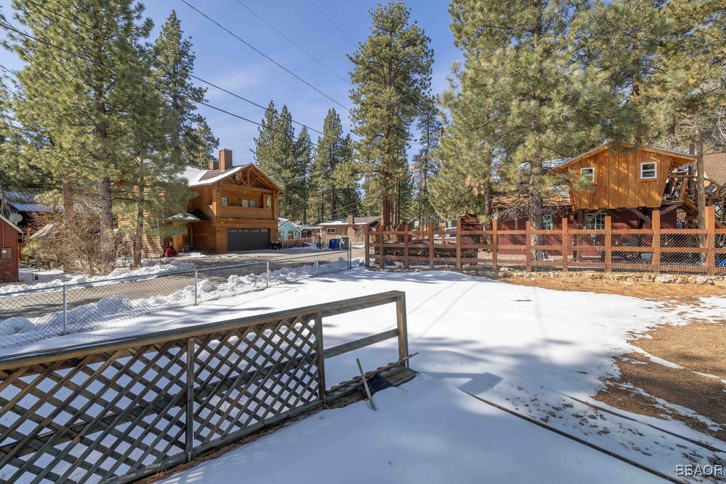 684 Chipmunk Lane Big Bear Lake, CA 92315 - Photo 33 of 49 a view of a yard and car parked