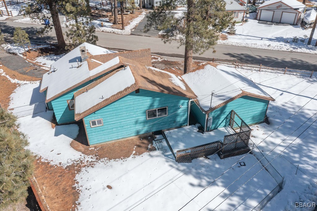 684 Chipmunk Lane Big Bear Lake, CA 92315 - Photo 39 of 49 a front view of a house with a yard