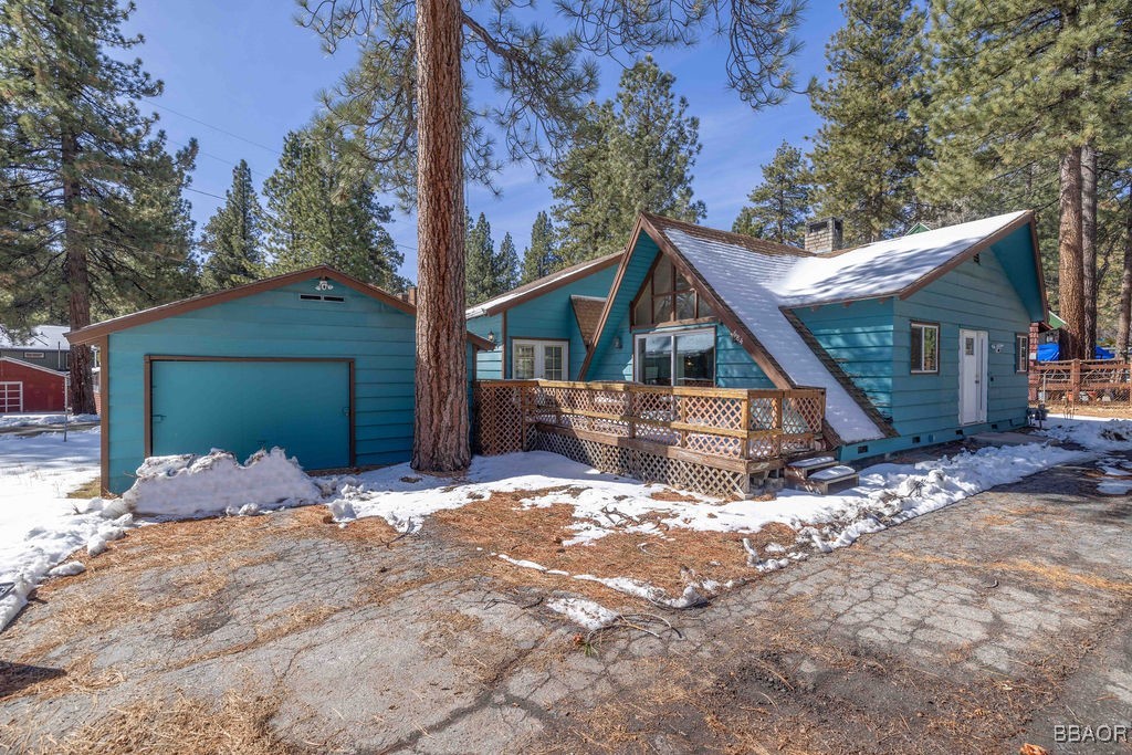 684 Chipmunk Lane Big Bear Lake, CA 92315 - Photo 45 of 49 a view of a house with a yard covered in snow