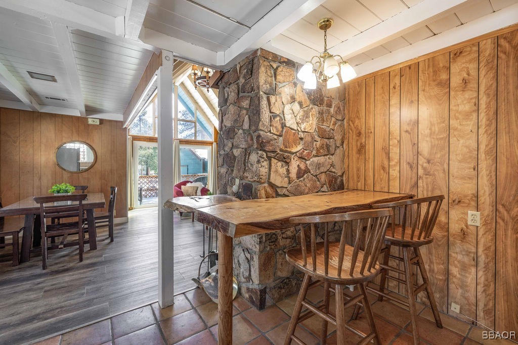 684 Chipmunk Lane Big Bear Lake, CA 92315 - Photo 10 of 49 a view of a dining room with furniture window and wooden floor