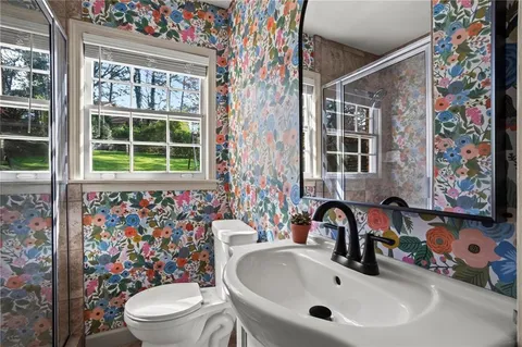 a bathroom with a sink and a toilet