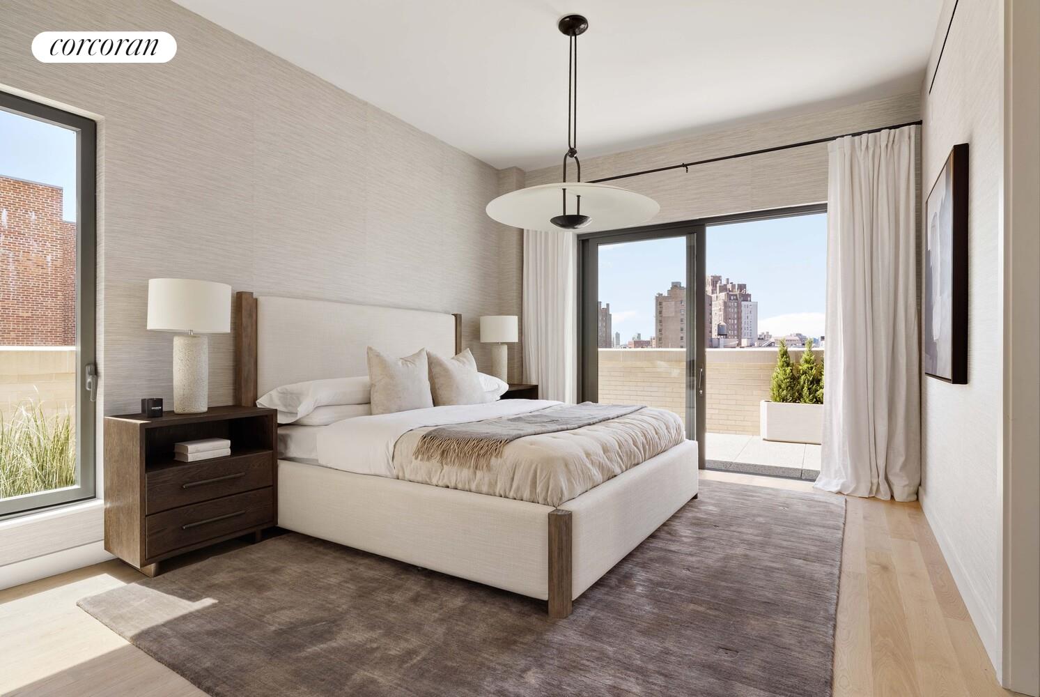 181 MacDougal Street, Unit PH Manhattan, NY 10011 - Photo 13 of 26 a bed room with a bed window and a flat screen tv