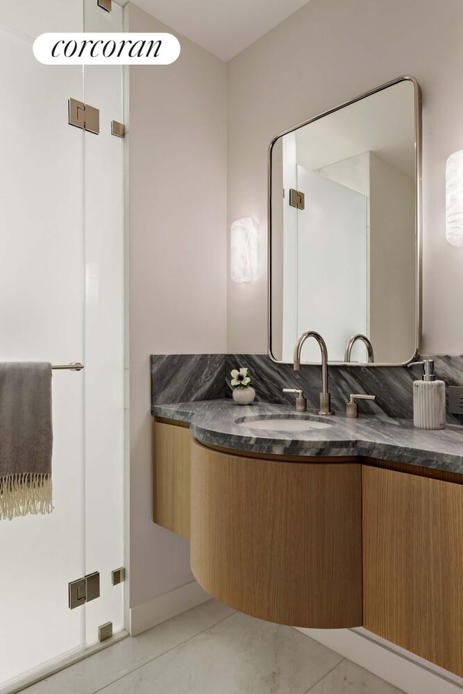 181 MacDougal Street, Unit PH Manhattan, NY 10011 - Photo 18 of 26 a close view of sink and mirror