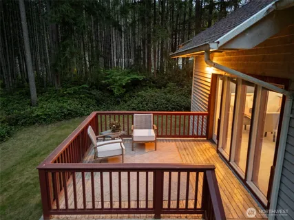 a view of balcony with furniture