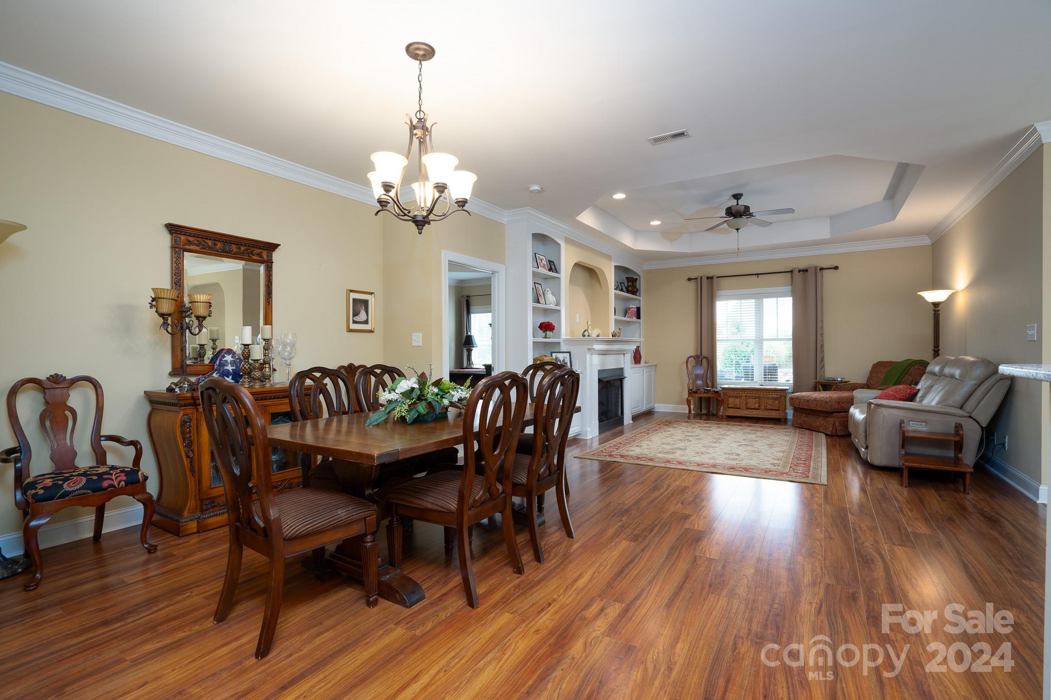 483 Pepperstone Drive Salisbury, NC 28146 - Photo 15 of 35 a view of a dining room with furniture window and wooden floor