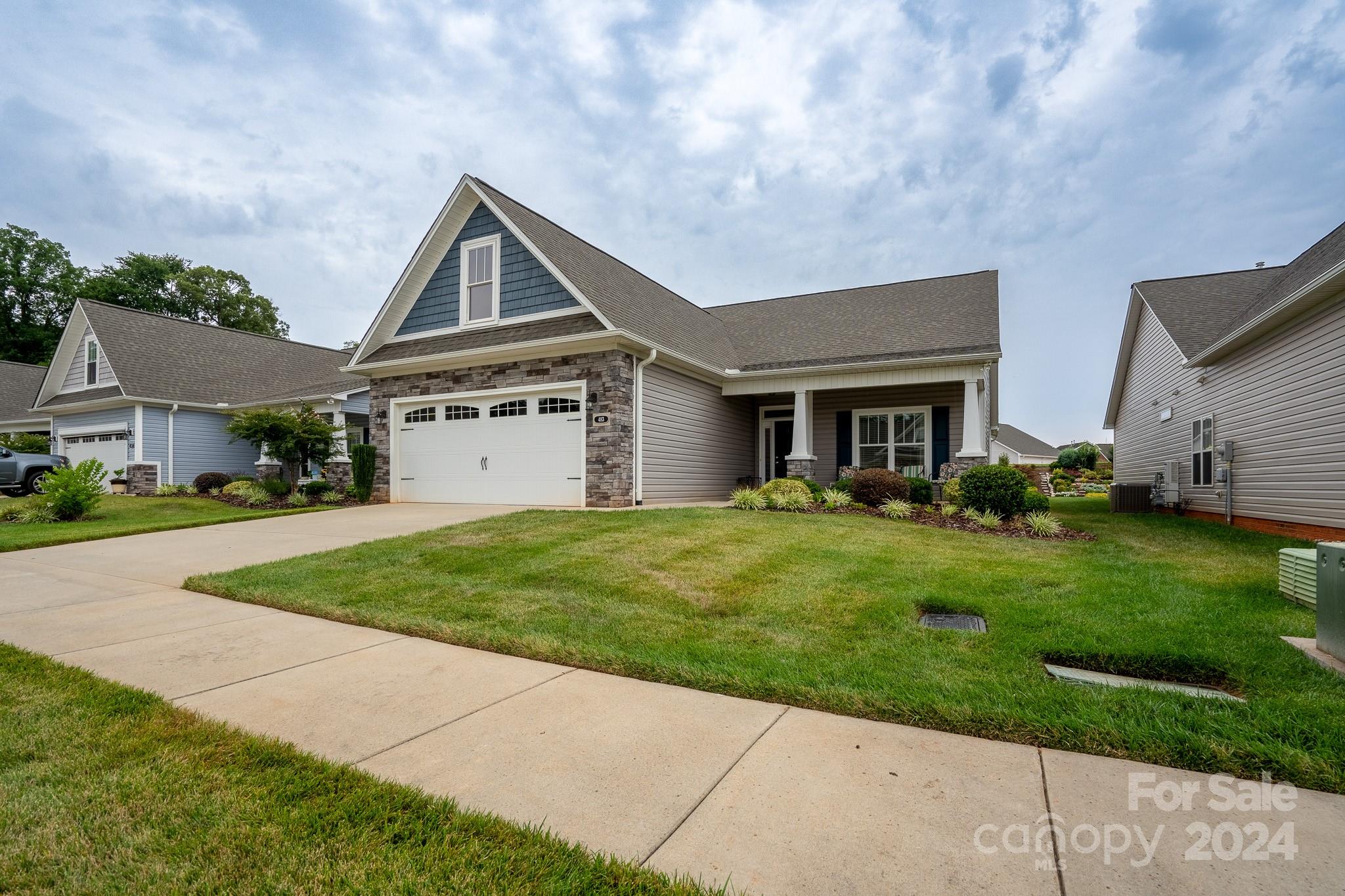 483 Pepperstone Drive Salisbury, NC 28146 - Photo 2 of 35 a house view with a garden space