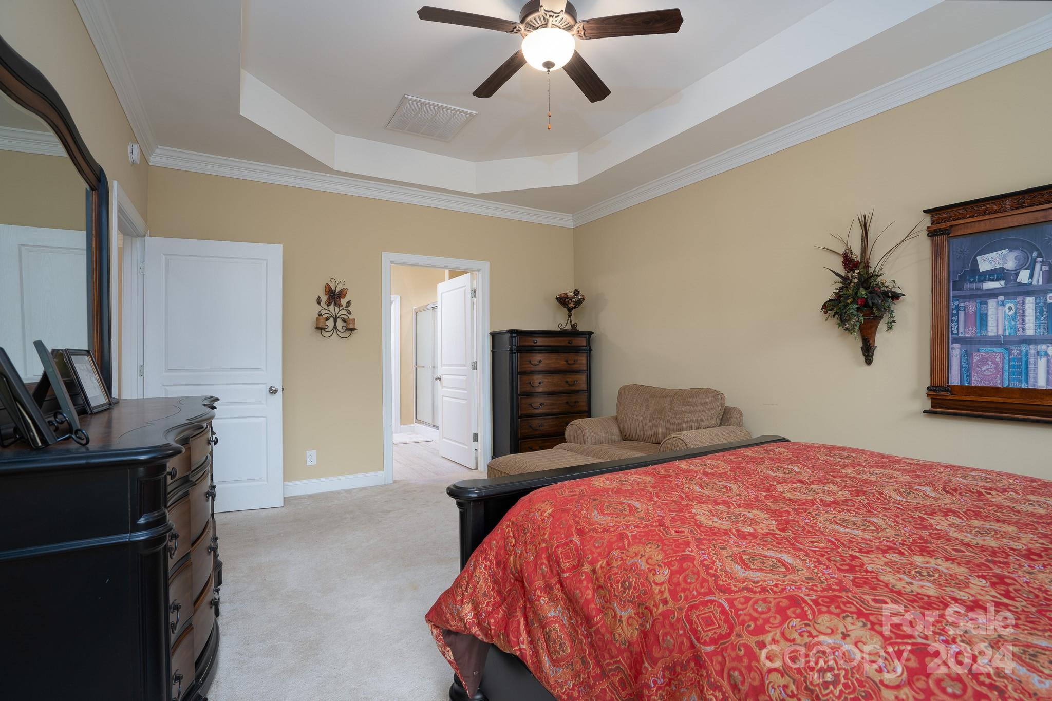 483 Pepperstone Drive Salisbury, NC 28146 - Photo 26 of 35 a bedroom with a bed and a flat screen tv