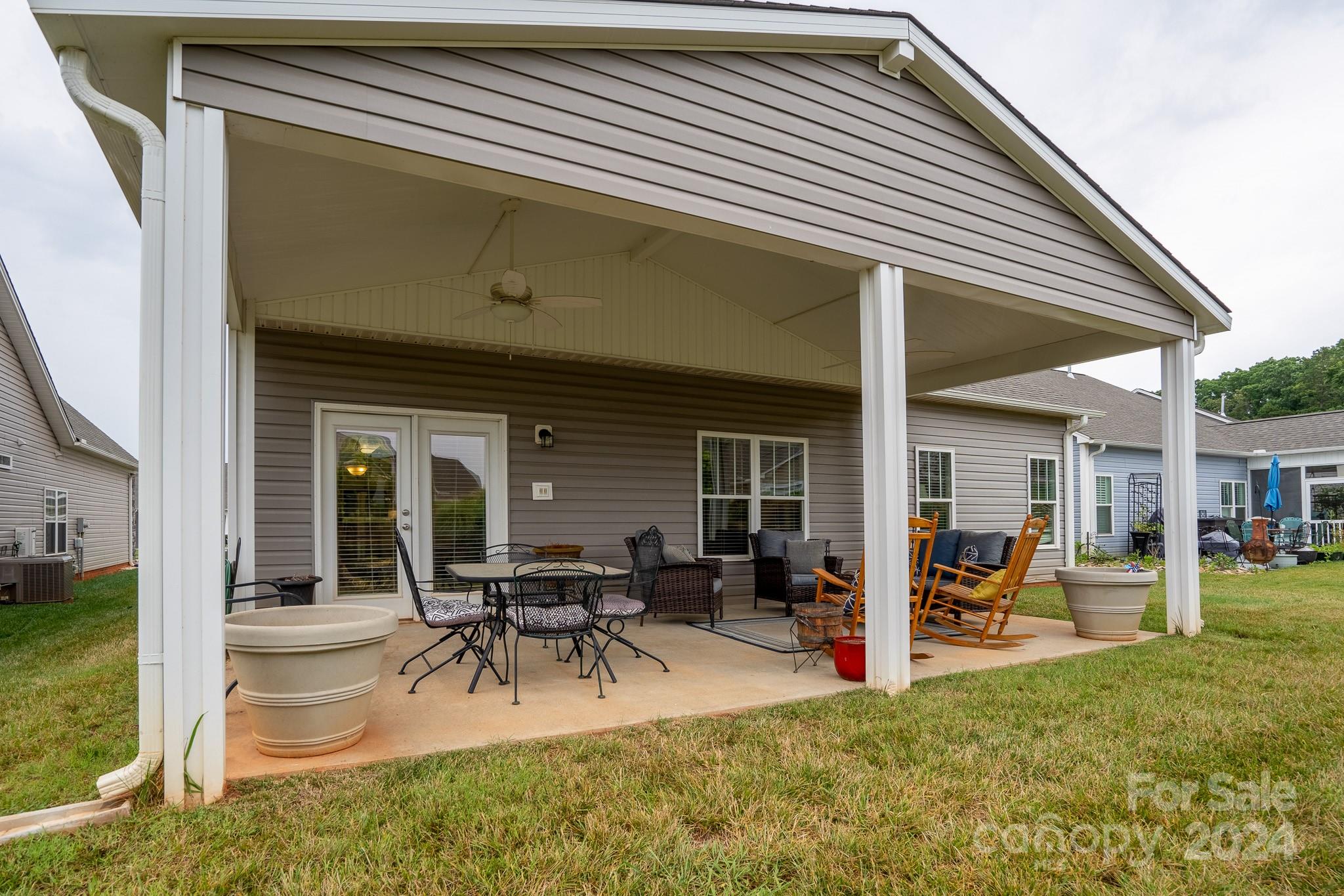 483 Pepperstone Drive Salisbury, NC 28146 - Photo 31 of 35 a view of a house with backyard porch and furniture