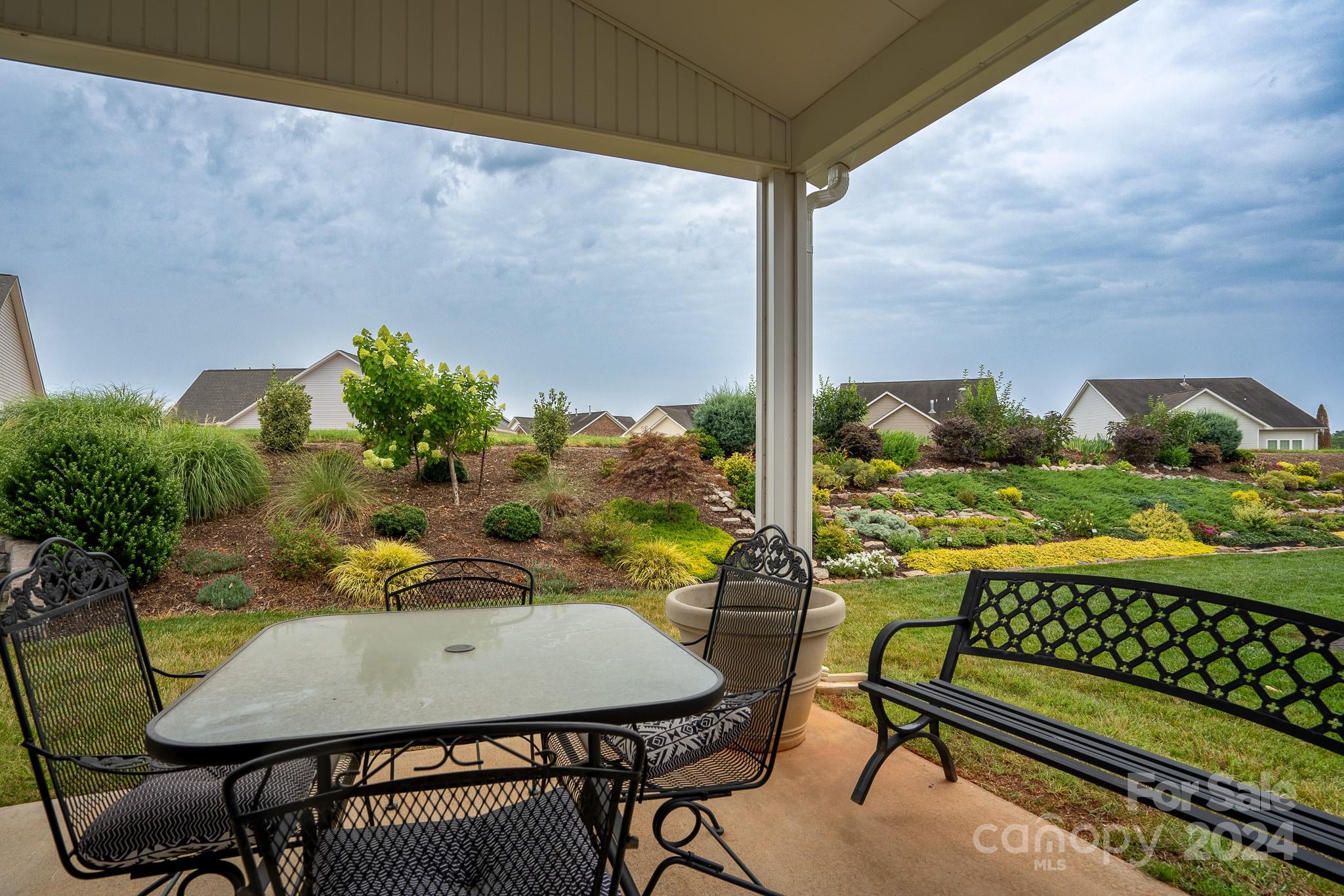 483 Pepperstone Drive Salisbury, NC 28146 - Photo 33 of 35 a view of a chairs and table in patio