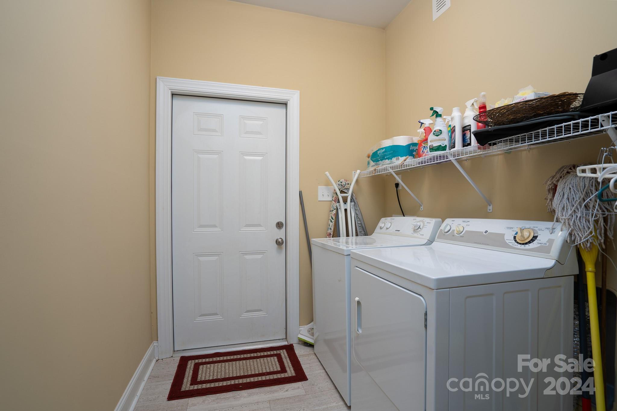 483 Pepperstone Drive Salisbury, NC 28146 - Photo 10 of 35 a utility room with dryer and washer