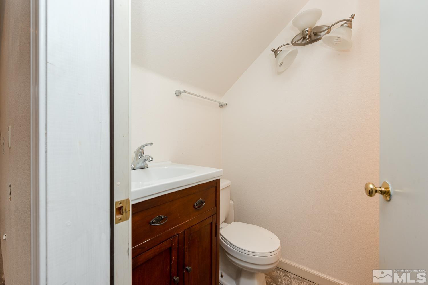 1290 Gordon Avenue Reno, NV 89509 - Photo 38 of 40 a bathroom with a sink a toilet and shower