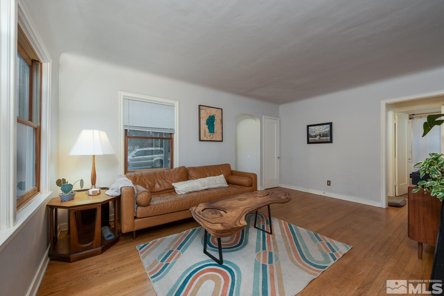 1290 Gordon Avenue Reno, NV 89509 - Photo 5 of 40 a living room with furniture a couch and a lamp