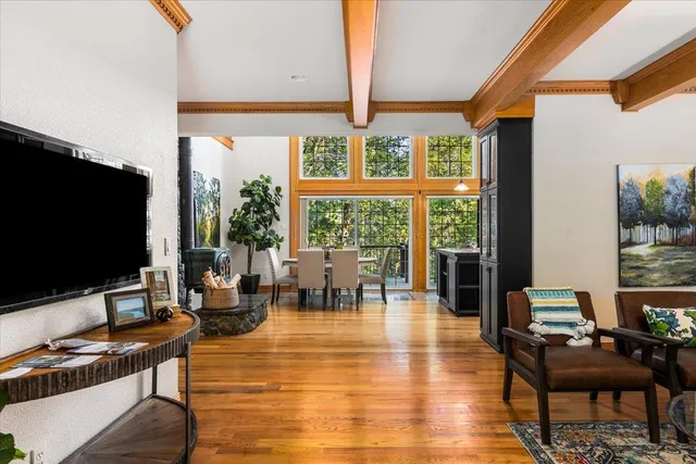 a kitchen with stainless steel appliances granite countertop a stove and a refrigerator
