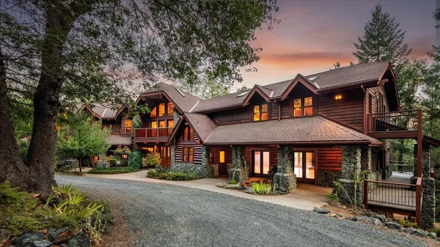 a bed room with a bed and a chair