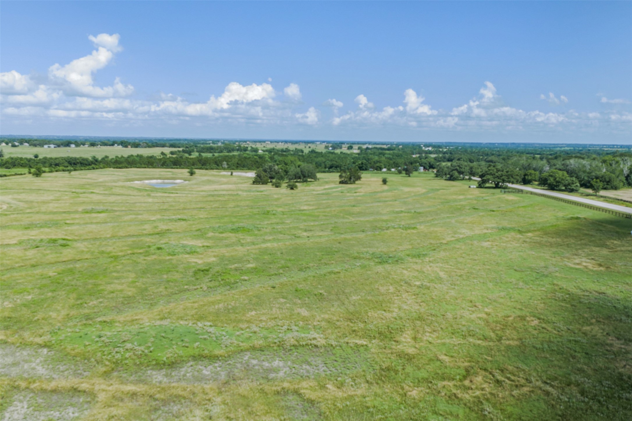 1291 West Tract 5 Round Top, TX 78954 - Photo 7 of 8 a view of a lake in middle of the town