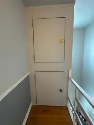a view of storage and utility room with empty racks