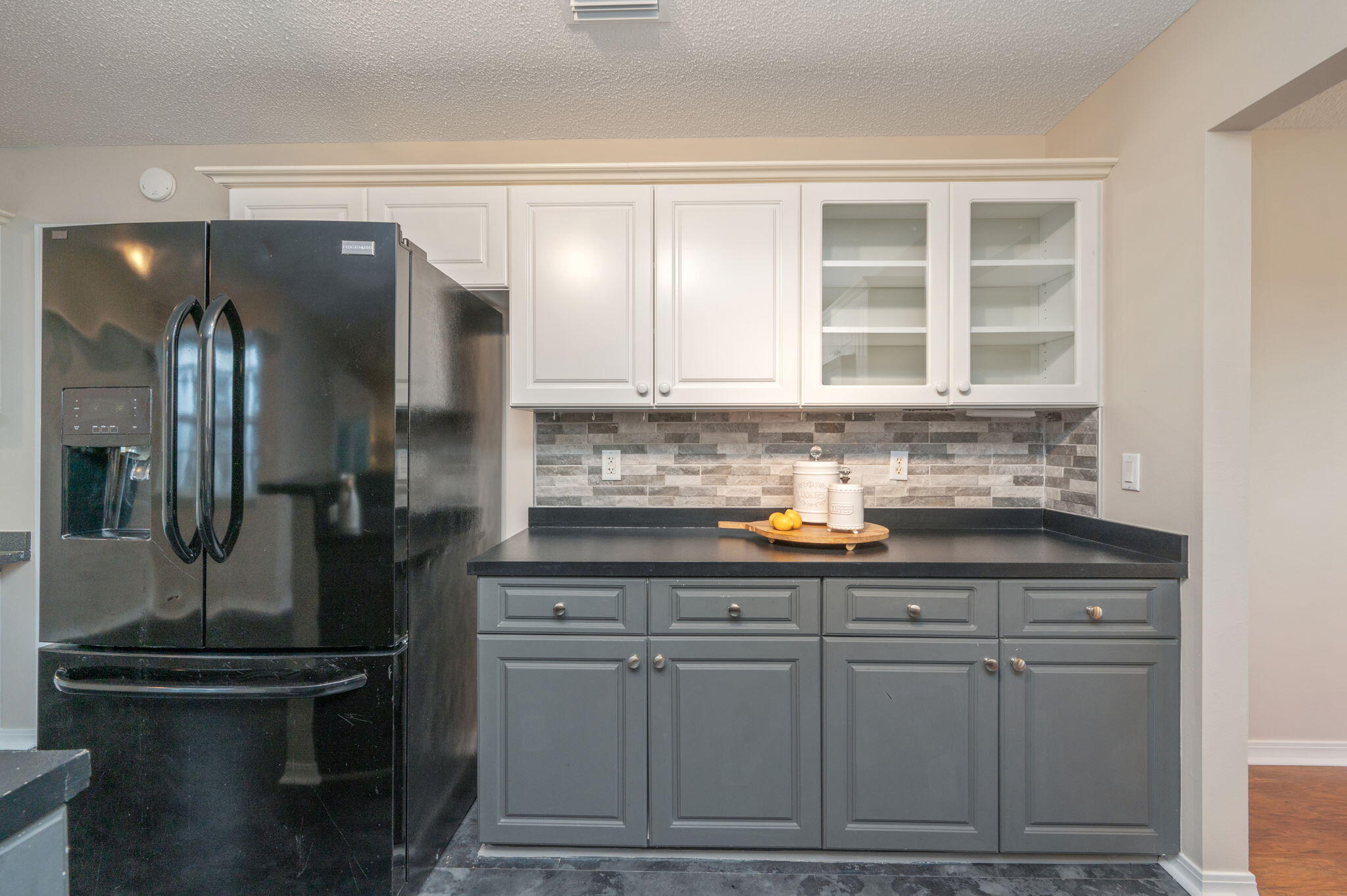 109 Eagle Drive Crestview, FL 32536 - Photo 18 of 52 a kitchen with stainless steel appliances granite countertop a refrigerator and a sink
