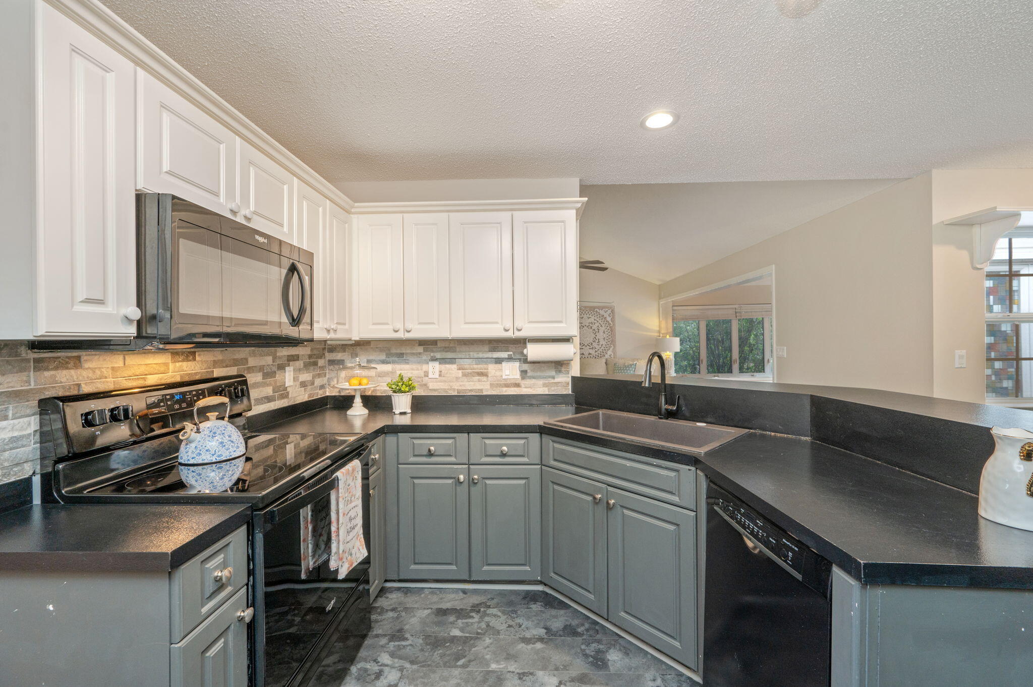 109 Eagle Drive Crestview, FL 32536 - Photo 19 of 52 a kitchen with a sink stove and cabinets