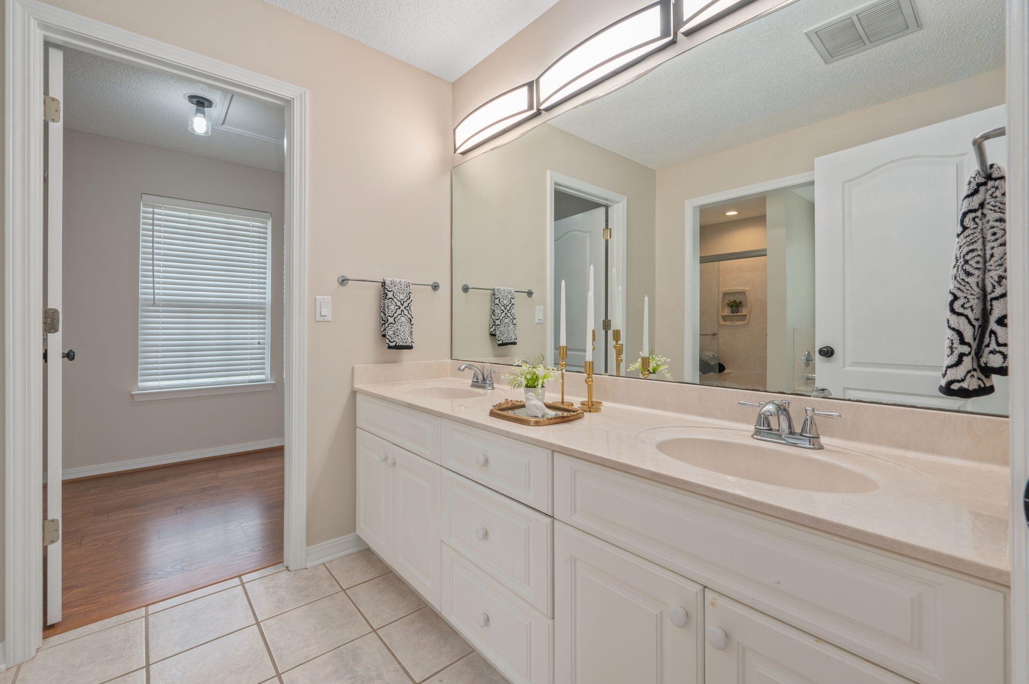 109 Eagle Drive Crestview, FL 32536 - Photo 26 of 52 a bathroom with a sink and a mirror