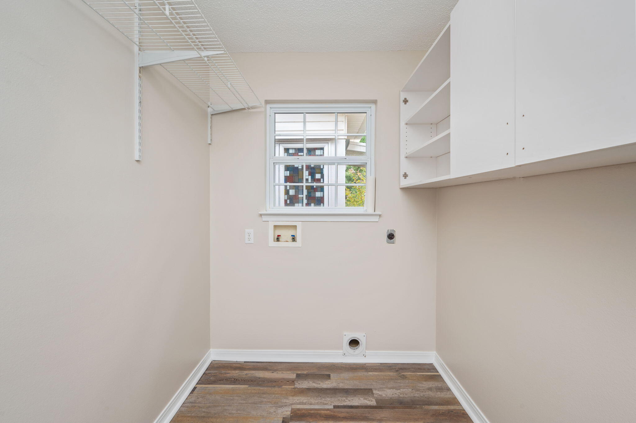 109 Eagle Drive Crestview, FL 32536 - Photo 42 of 52 a view of small space with wooden floor and window