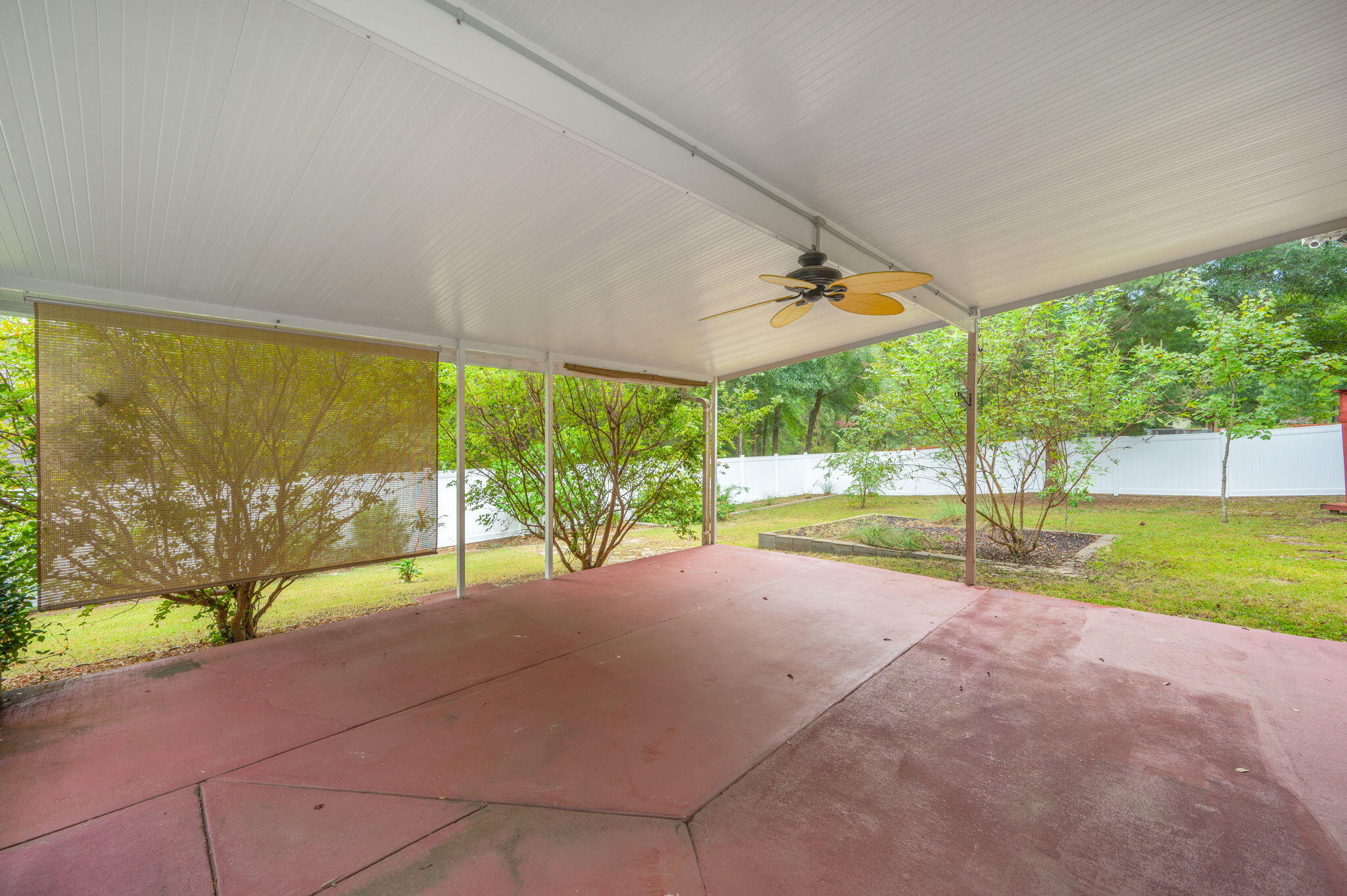 109 Eagle Drive Crestview, FL 32536 - Photo 45 of 52 a view of a garden with an outdoor space
