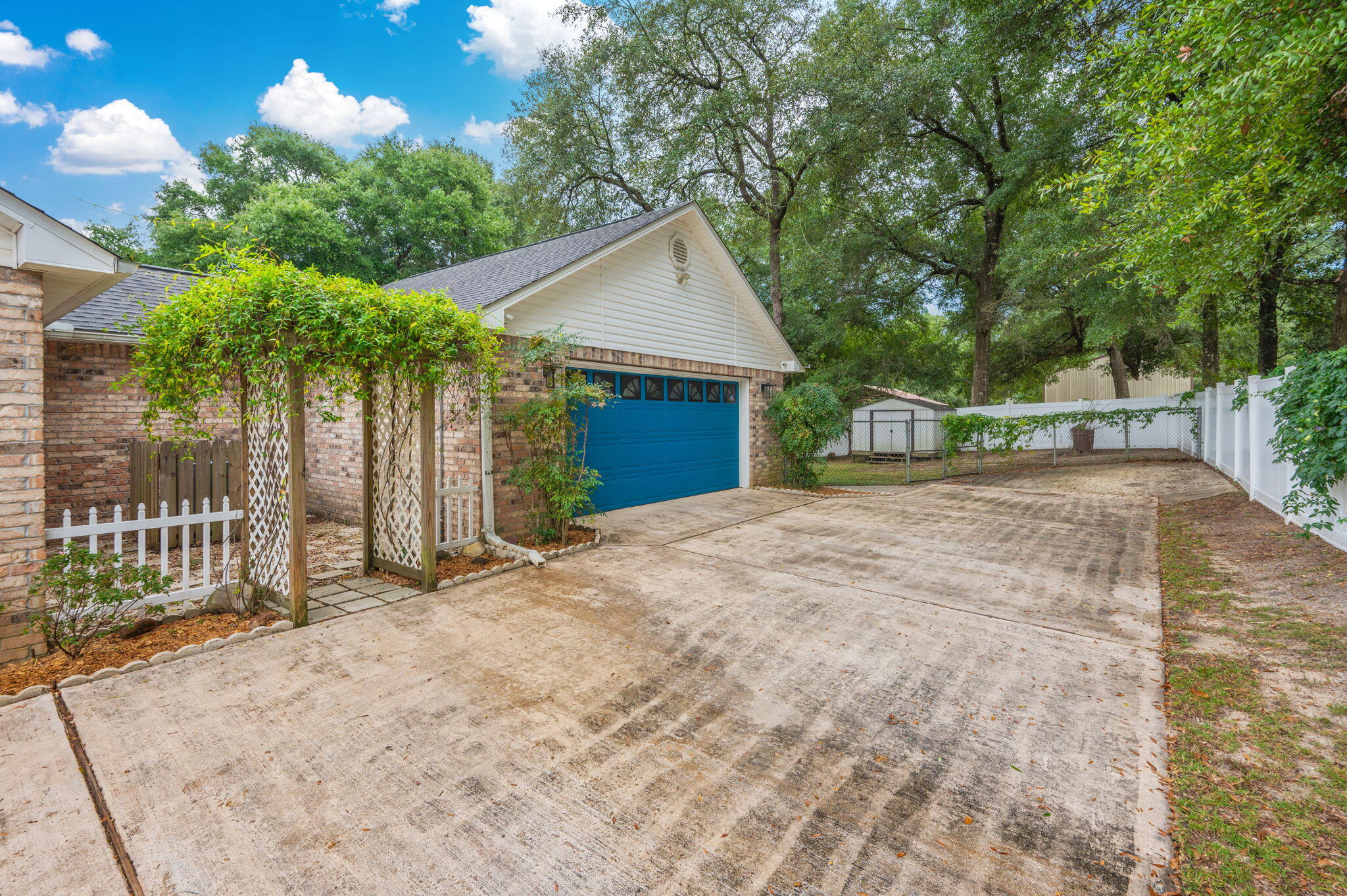 109 Eagle Drive Crestview, FL 32536 - Photo 46 of 52 a view of a house with a yard and large tree